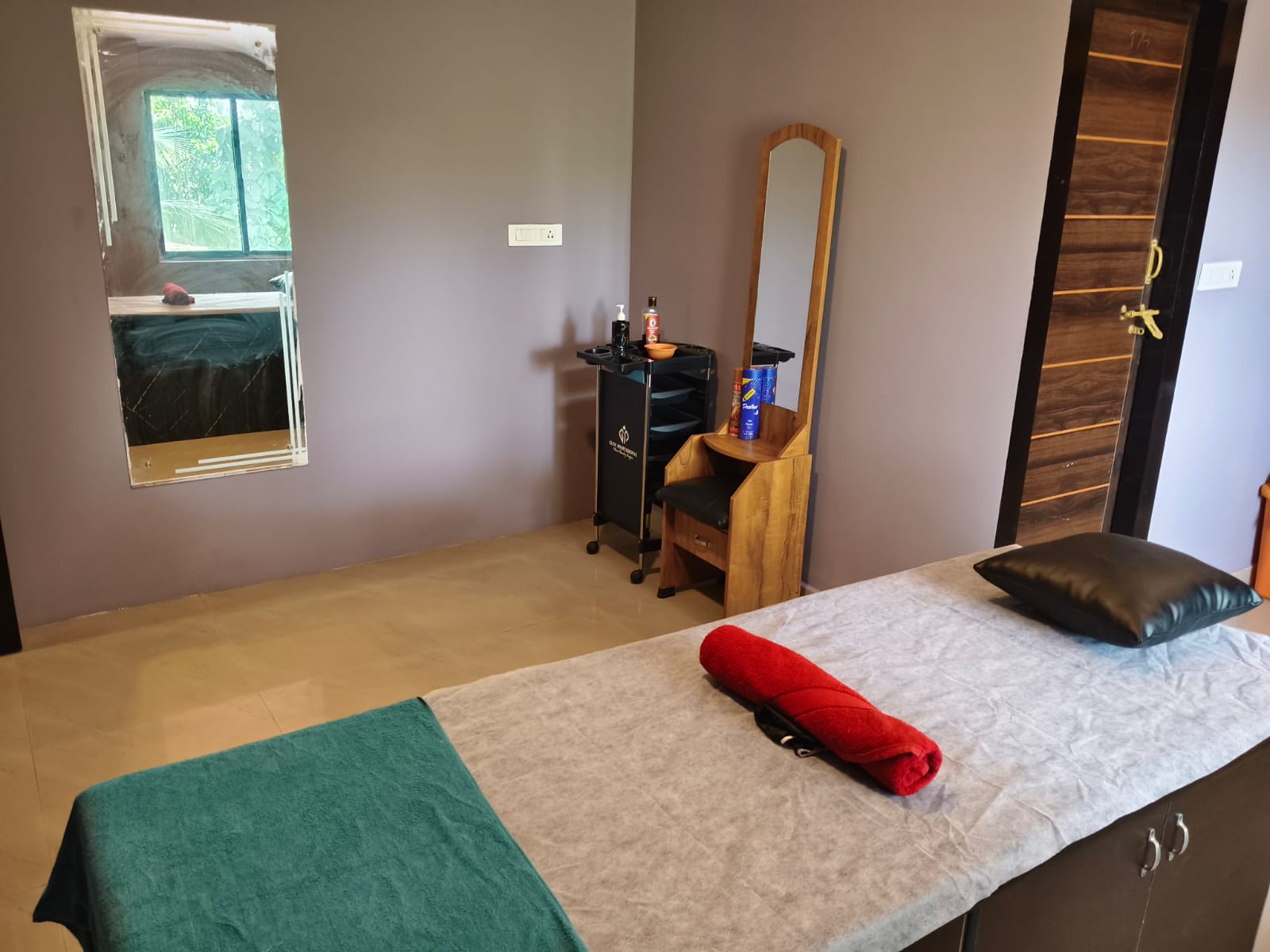 Massage bed and treatment area at the spa